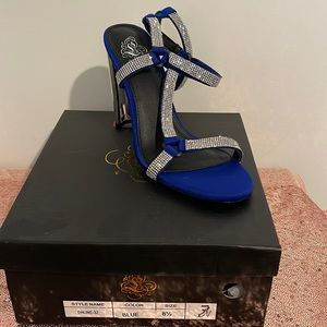 Beautiful blue strap up rhinestone heels! Make these an amazing statement piece!